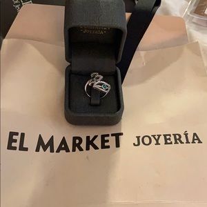 Silver Ring with emeralds